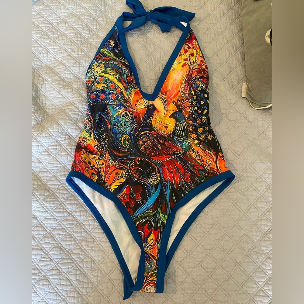 Swimshy peacock one piece. Never been worn